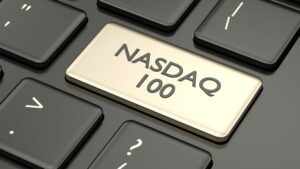 Close-up of a keyboard key labeled “NASDAQ 100”