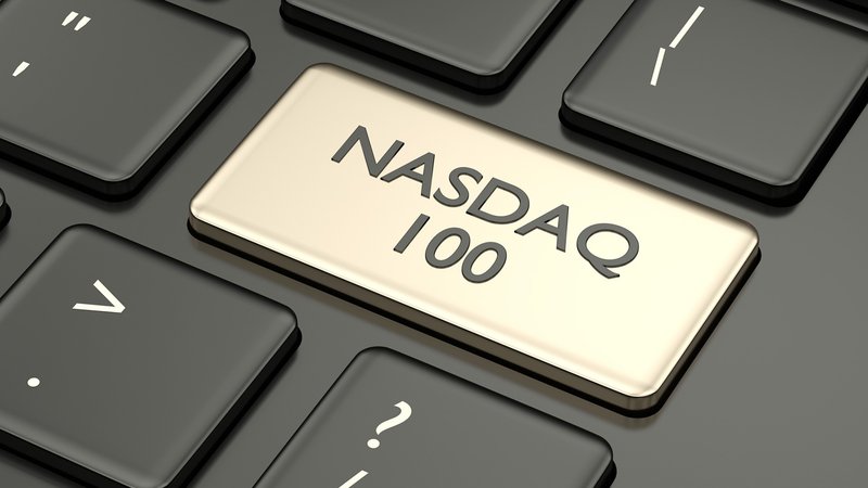 Close-up of a keyboard key labeled “NASDAQ 100”